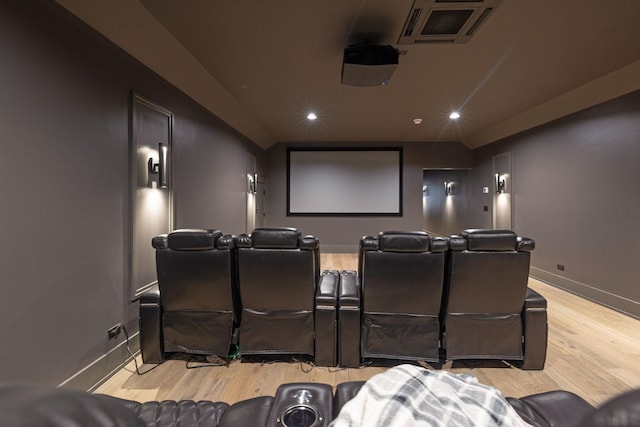 6490 Peytonsville Arno Rd, College Grove, TN 37046 - home theater featuring recessed lighting, light wood-style floors, visible vents, and baseboards