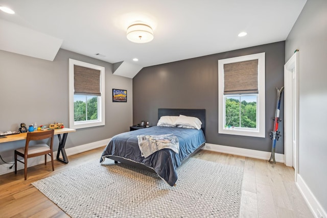 6490 Peytonsville Arno Rd, College Grove, TN 37046 - bedroom with baseboards, light wood-style flooring, visible vents, and recessed lighting