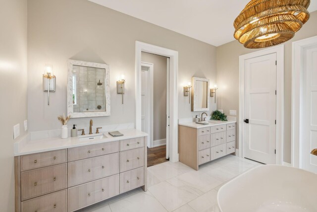 6490 Peytonsville Arno Rd, College Grove, TN 37046 - bathroom with a tile shower, two vanities, a freestanding tub, and a sink