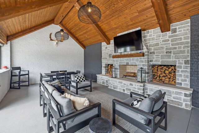 6490 Peytonsville Arno Rd, College Grove, TN 37046 - view of patio with an outdoor living space with a fireplace