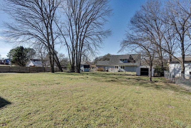 view of yard with a shed and an outdoor structure