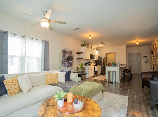 782 Riverfront Pkwy Unit 301, Chattanooga, TN 37402 - living area featuring wood finished floors, visible vents, and a ceiling fan