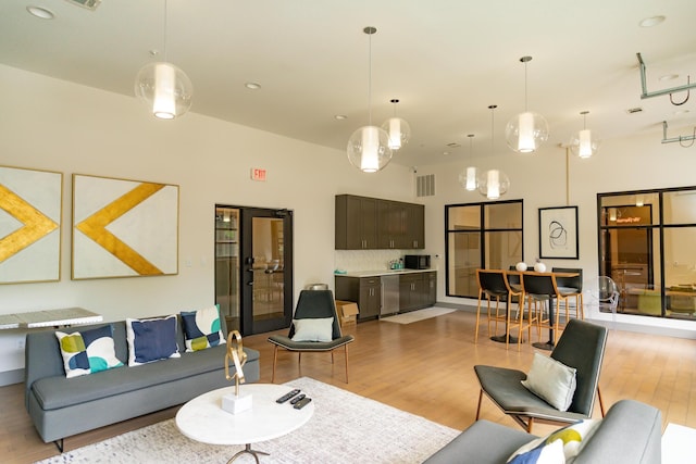 782 Riverfront Pkwy Unit 301, Chattanooga, TN 37402 - living room featuring light wood-type flooring, visible vents, and recessed lighting