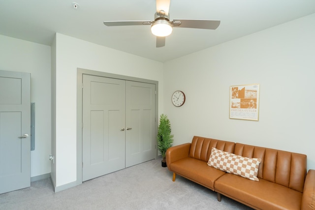 782 Riverfront Pkwy Unit 301, Chattanooga, TN 37402 - living room with baseboards, carpet flooring, and ceiling fan