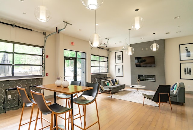 782 Riverfront Pkwy Unit 301, Chattanooga, TN 37402 - dining room featuring wood finished floors