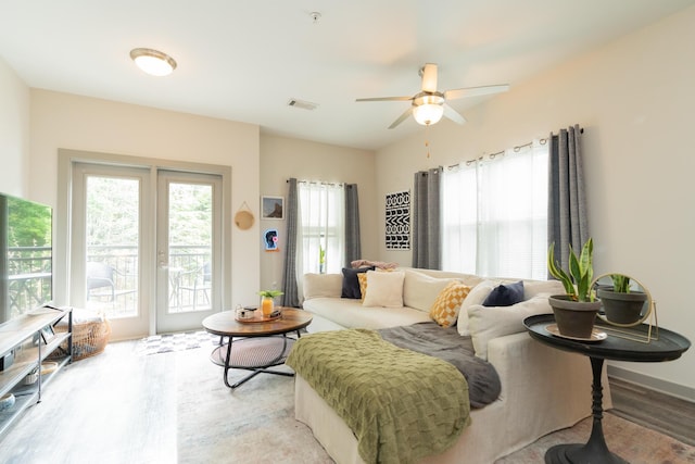 782 Riverfront Pkwy Unit 301, Chattanooga, TN 37402 - living room with ceiling fan, visible vents, and light wood-type flooring