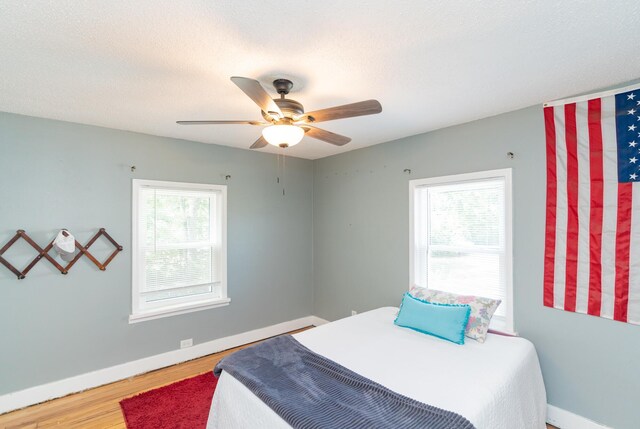 314 Williams Dr, Chattanooga, TN 37421 - bedroom featuring wood finished floors, baseboards, and ceiling fan
