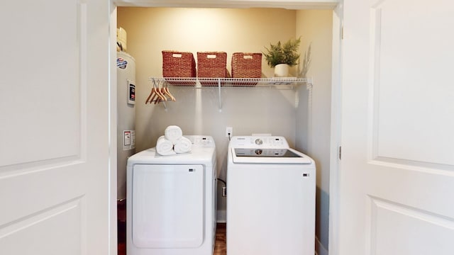 laundry room with washer and dryer