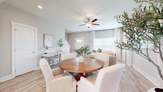 dining space featuring light wood-type flooring, ceiling fan, baseboards, and recessed lighting