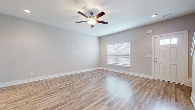 entryway with light wood-style floors, a ceiling fan, baseboards, and recessed lighting