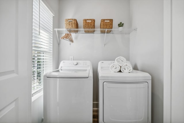 laundry room with washing machine and dryer and laundry area