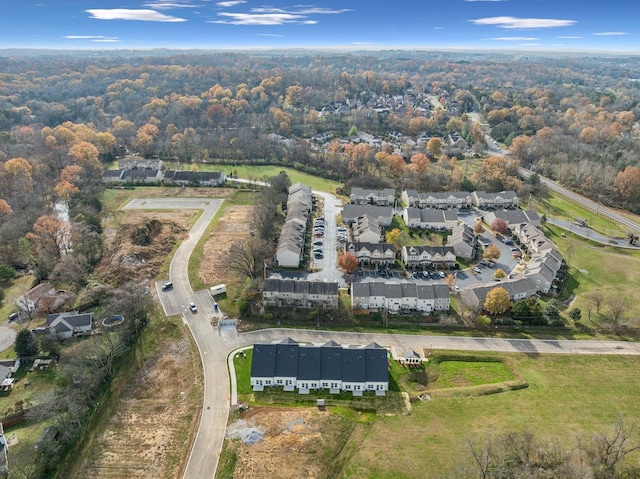 bird's eye view with a view of trees