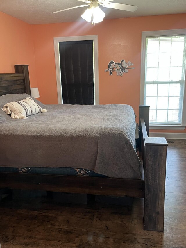 280 Switchboard Rd, Portland, TN 37148 - bedroom with dark wood-style floors and ceiling fan