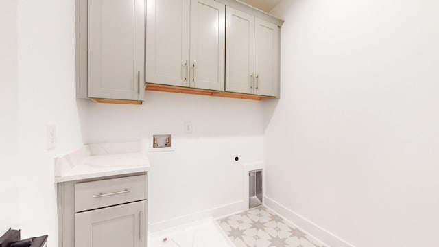 108 Shadow Springs Dr Unit 108, Brentwood, TN 37027 - clothes washing area with electric dryer hookup, cabinet space, hookup for a washing machine, and baseboards