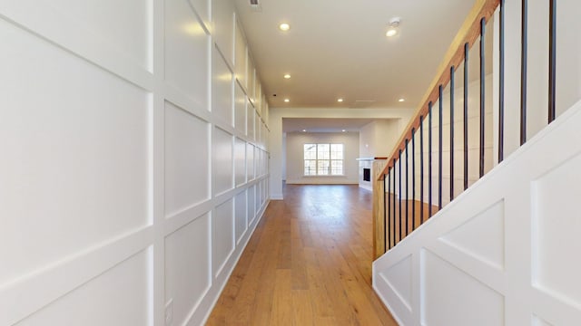 108 Shadow Springs Dr Unit 108, Brentwood, TN 37027 - hallway with stairway, light wood finished floors, and recessed lighting