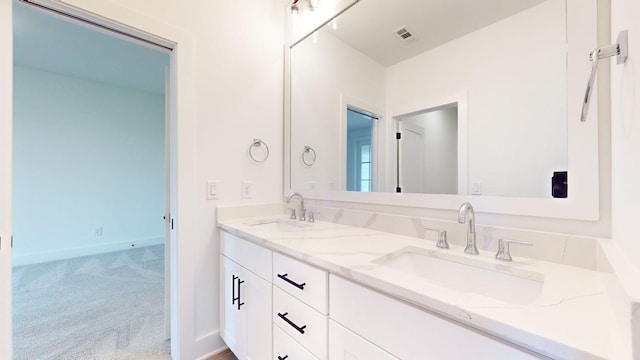 108 Shadow Springs Dr Unit 108, Brentwood, TN 37027 - full bath with baseboards, visible vents, a sink, and double vanity