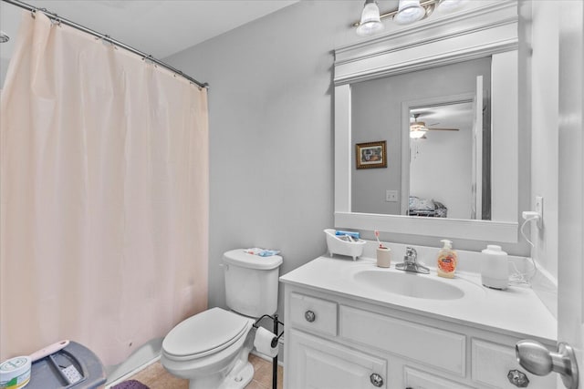 9051 Haileys Pond Dr, Ooltewah, TN 37363 - full bath with toilet, vanity, a ceiling fan, and tile patterned floors