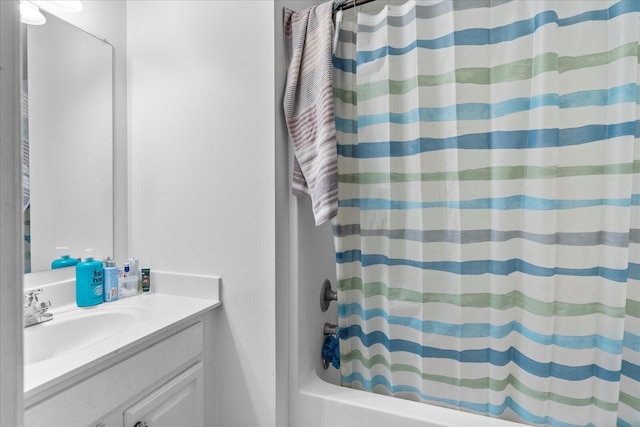 9051 Haileys Pond Dr, Ooltewah, TN 37363 - bathroom featuring vanity and shower / bath combo with shower curtain