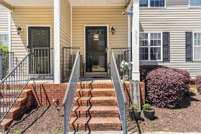 9051 Haileys Pond Dr, Ooltewah, TN 37363 - property entrance featuring a porch