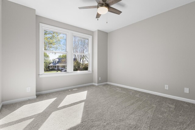 302 Windrush Dr, Clarksville, TN 37042 - carpeted empty room with baseboards, a ceiling fan, and visible vents