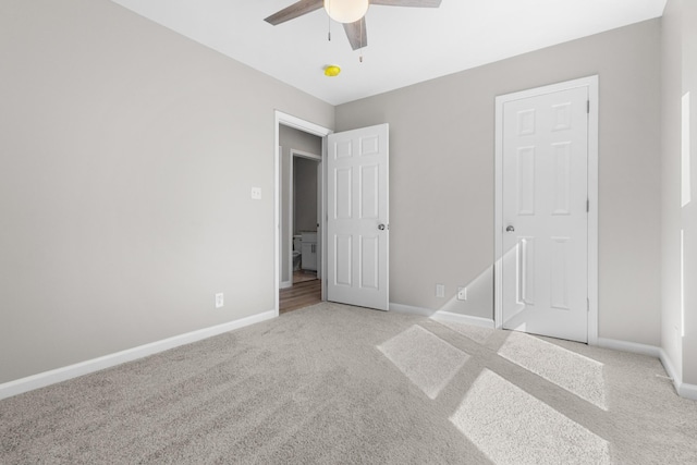 302 Windrush Dr, Clarksville, TN 37042 - unfurnished bedroom with light colored carpet, ceiling fan, and baseboards