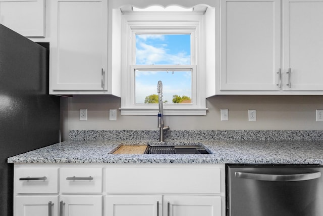 302 Windrush Dr, Clarksville, TN 37042 - kitchen with a sink, freestanding refrigerator, white cabinetry, light stone countertops, and dishwasher