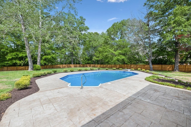 view of pool with a fenced backyard, a fenced in pool, a patio, and a lawn
