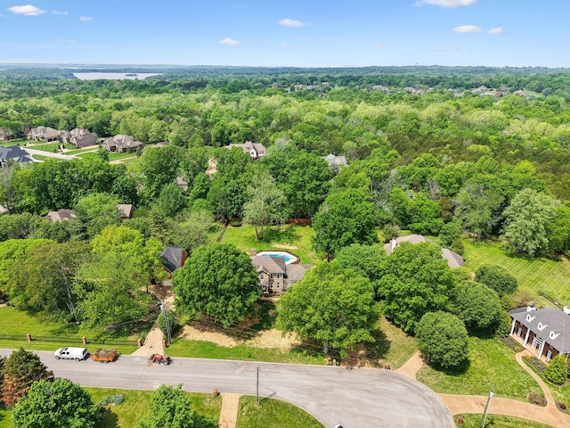 bird's eye view with a forest view