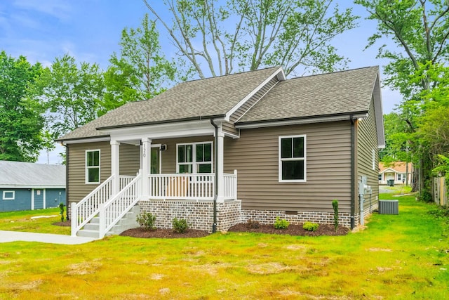 120 23rd Ave E, Springfield, TN 37172 - bungalow-style house featuring a porch, a front yard, a shingled roof, crawl space, and central air condition unit