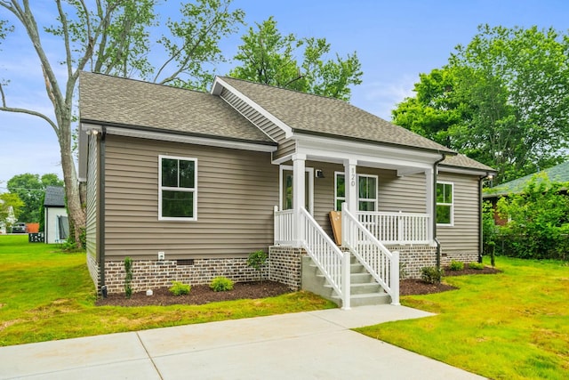 120 23rd Ave E, Springfield, TN 37172 - bungalow-style house with crawl space, covered porch, a front yard, and roof with shingles