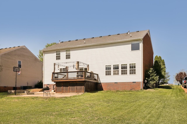 back of property featuring a pergola, crawl space, a wooden deck, a patio area, and a lawn