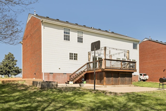 back of property featuring a lawn, a wooden deck, crawl space, and stairs