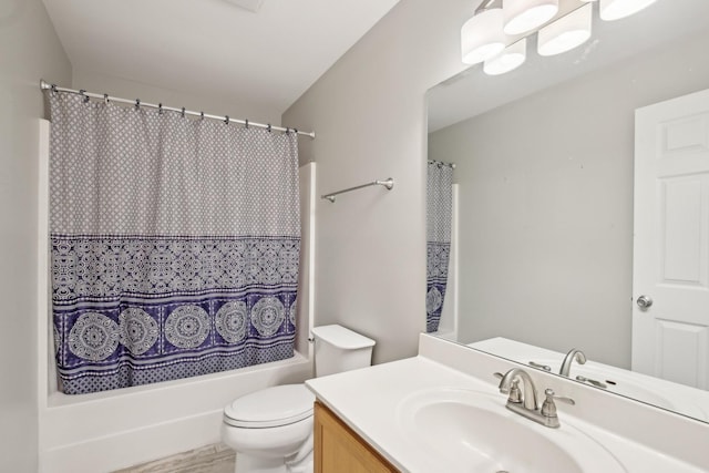 bathroom with toilet, vanity, and shower / bath combination with curtain