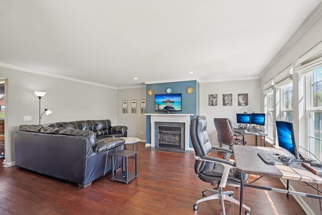 interior space featuring a fireplace with flush hearth, recessed lighting, dark wood-type flooring, crown molding, and baseboards