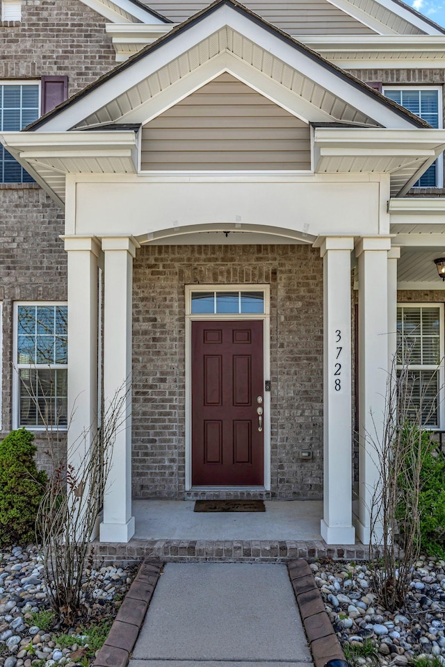 3728 Hoggett Ford Rd, Hermitage, TN 37076 - view of exterior entry featuring brick siding and a porch