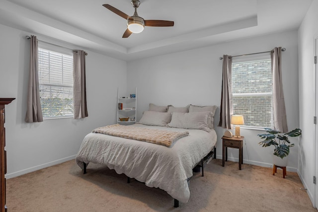 3728 Hoggett Ford Rd, Hermitage, TN 37076 - bedroom with light carpet, a ceiling fan, baseboards, and a raised ceiling