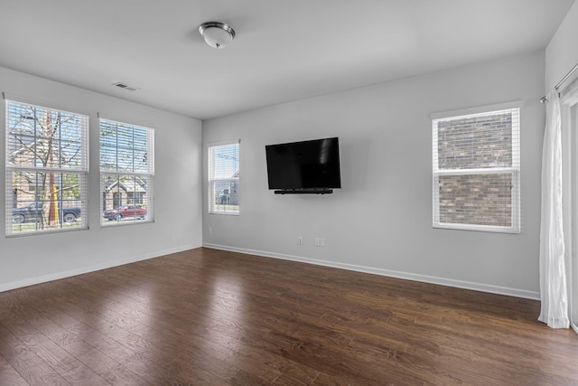 3728 Hoggett Ford Rd, Hermitage, TN 37076 - unfurnished living room featuring dark wood finished floors, baseboards, and visible vents
