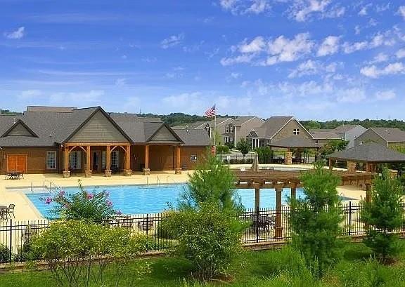 3728 Hoggett Ford Rd, Hermitage, TN 37076 - community pool featuring fence, a residential view, and a patio