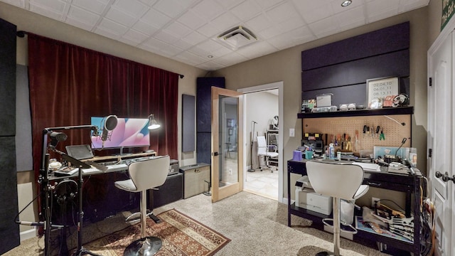 office with french doors and visible vents