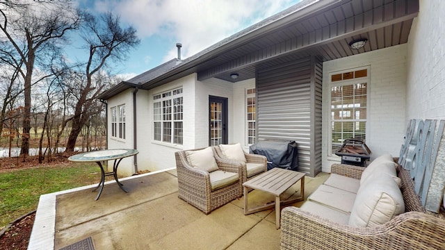 view of patio featuring an outdoor living space and area for grilling