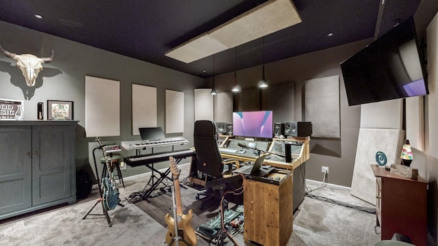 home office with baseboards and carpet floors