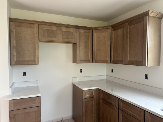 1229 Elizabeth Ln, Clarksville, TN 37042 - kitchen with light countertops and brown cabinetry
