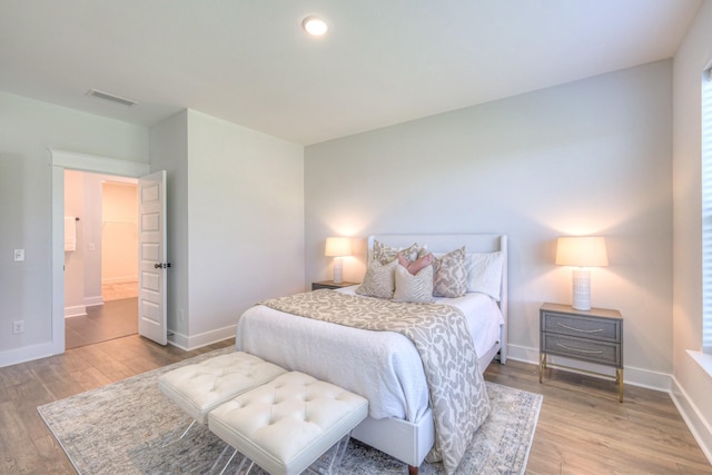 1084 Linn Cove Ct, Gallatin, TN 37066 - bedroom with baseboards, wood finished floors, visible vents, and recessed lighting
