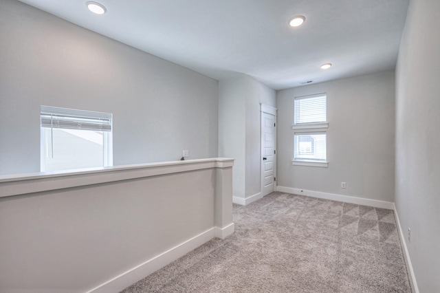 1084 Linn Cove Ct, Gallatin, TN 37066 - unfurnished room featuring light colored carpet, baseboards, visible vents, and recessed lighting