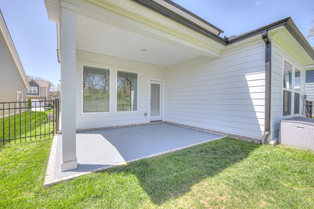 1084 Linn Cove Ct, Gallatin, TN 37066 - back of house featuring fence, a patio area, and a lawn