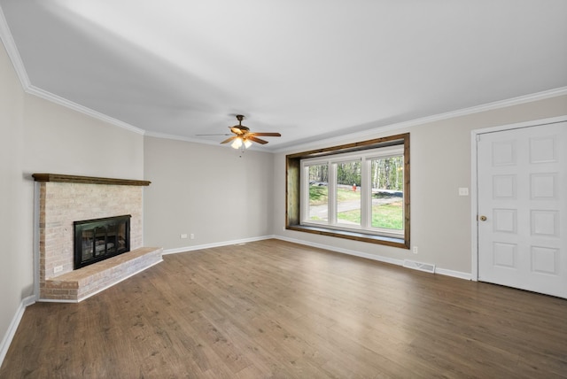unfurnished living room featuring ceiling fan, baseboards, wood finished floors, and visible vents