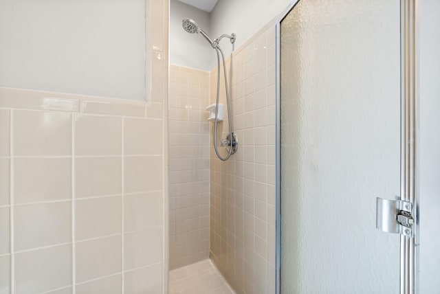 bathroom featuring a stall shower