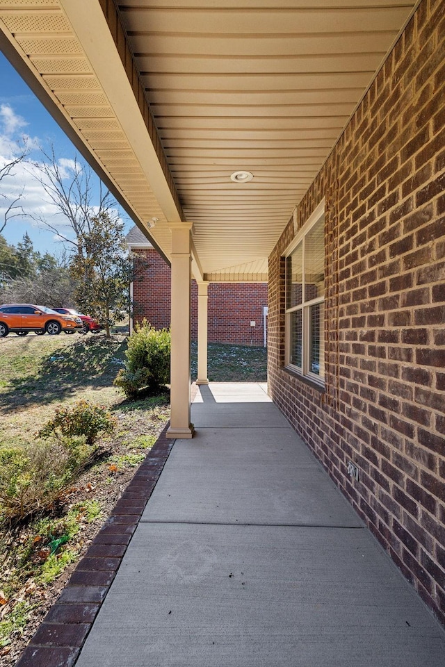 view of patio featuring a porch