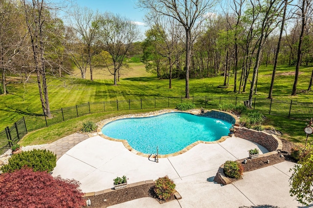 view of swimming pool featuring a patio area, a fenced in pool, a lawn, and a fenced backyard