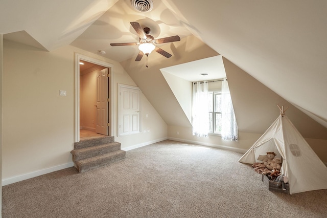 bonus room with carpet, ceiling fan, baseboards, lofted ceiling, and visible vents